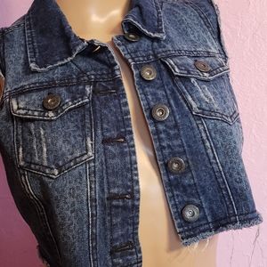 Pre- owned dark blue jean vest. Size Small
